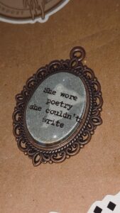 "She wore poetry.." Rose Bronze pendant OOPSIE photo review